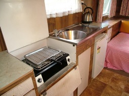 Kitchen in Kangaroo, our 1980's retro onsite caravan at Grampians Paradise Camping and Caravan Parkland